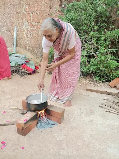 Preparing an offering over a wood fire