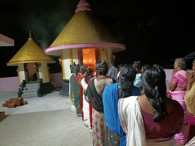Devotees offering prayers at the shrine